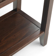 Simpli-Home Acadian wide console sofa table in brunette brown wood finish, featuring a sleek design and spacious surface.