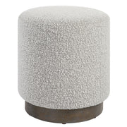 Uttermost Avila accent ottoman with plush fabric and wooden legs, serving as stylish and functional home decor.