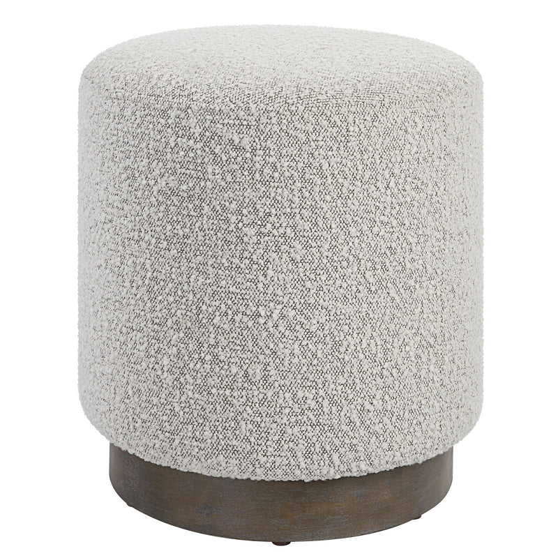 Uttermost Avila accent ottoman with plush fabric and wooden legs, serving as stylish and functional home decor.