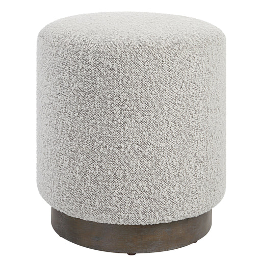 Uttermost Avila accent ottoman with plush fabric and wooden legs, serving as stylish and functional home decor.