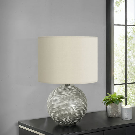 Modern gray and cream table lamp by 8th Street with a sleek design, showcasing a stylish and contemporary lighting fixture.