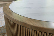 Camdill - Round Cocktail Table - Light Brown / White - R&R Furniture Gallery (Fountain Valley, CA)