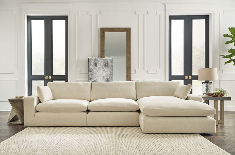 Benchcraft Elyza sectional set with four-piece living room furniture arrangement featuring plush cushions and modern design.