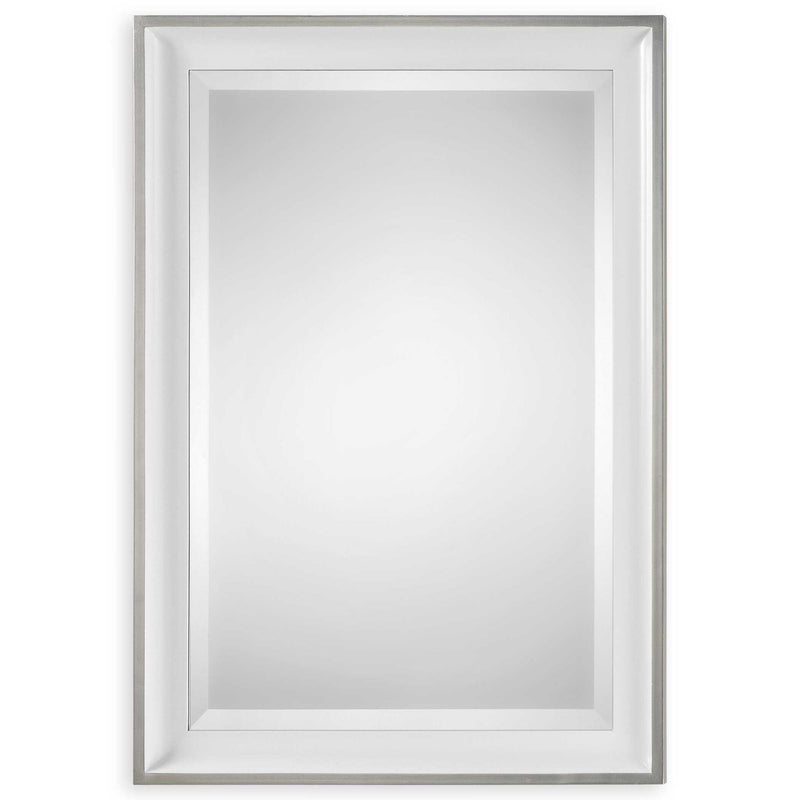 Uttermost Lahvahn white silver wall mirror with a sleek, modern frame hanging on a wall.