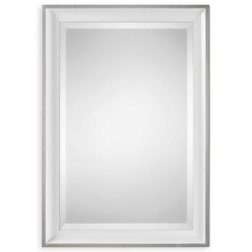Uttermost Lahvahn white silver wall mirror with a sleek, modern frame hanging on a wall.