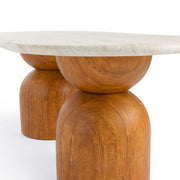 Brown indoor/outdoor dining table with travertine top and TOV Furniture branding, measuring 87 inches long.