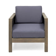 Outdoor Noble House acacia wood arm chair with wicker accents, featuring a sturdy frame and comfortable seating for outdoor spaces.