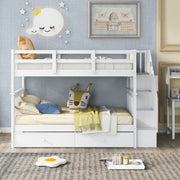DreamHaus stairway bunk bed with built-in storage drawers and safety guard rails in a bedroom setting.
