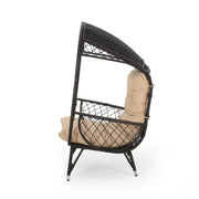 Noble House outdoor wicker standing basket chair with cushion, accent chair featuring woven wicker and plush seating.