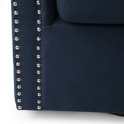 Modern upholstered Noble House swivel club chair with nailhead trim, featuring plush fabric and a rounded backrest with armrests.