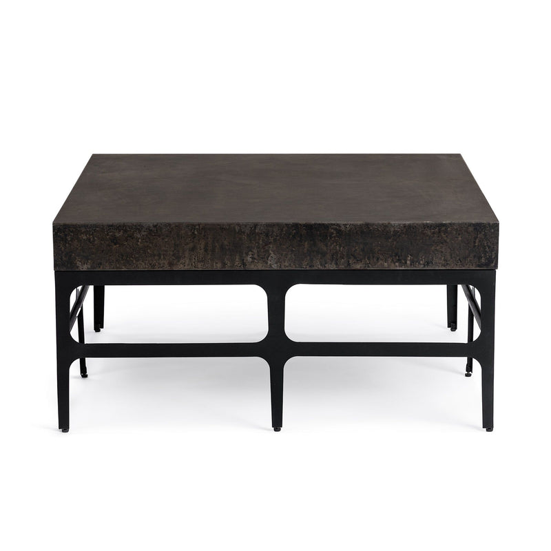 Rust noir Adela coffee table by Classic Home featuring a sleek, modern design with a smooth surface and sturdy legs.