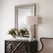 Uttermost Seymour wall mirror in antique silver with a sleek, modern frame and reflective glass, suitable for contemporary decor.