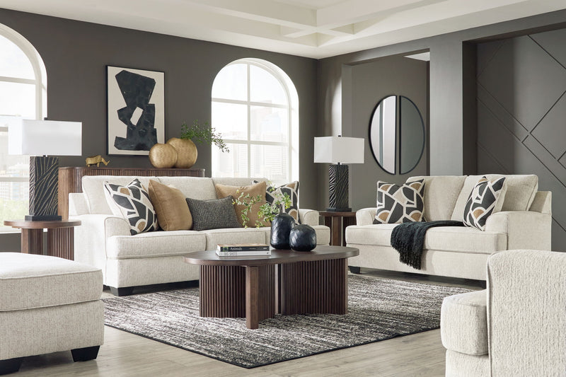 Benchcraft® Heartcort living room set with stationary chair and ottoman, featuring plush upholstery and modern design.