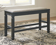 Signature Design by Ashley Tyler Creek double counter height upholstered bench in antique black fabric with a sleek, modern design.