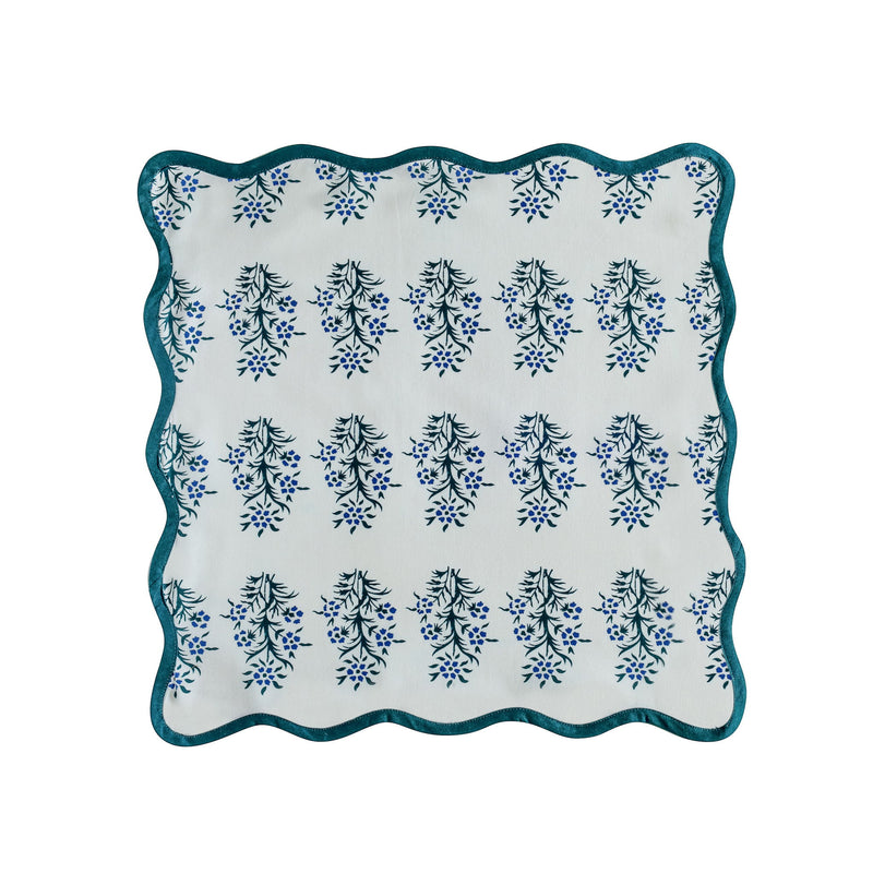 Set of four TOV Furniture Crissy cotton canvas printed napkins with blue cornflower design for table decor.