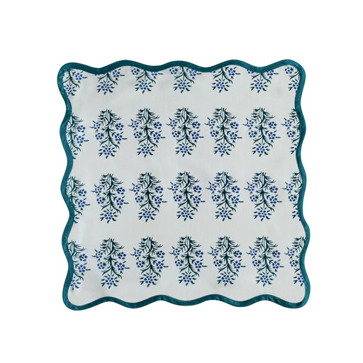 Set of four TOV Furniture Crissy cotton canvas printed napkins with blue cornflower design for table decor.