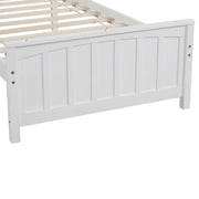 DreamHaus platform trundle bed with sleek wooden frame and pull-out under-bed storage for space-saving sleeping solutions.