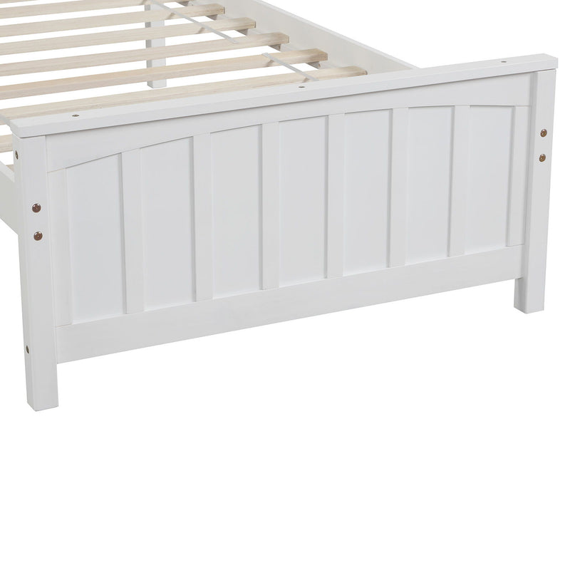 DreamHaus platform trundle bed with sleek wooden frame and pull-out under-bed storage for space-saving sleeping solutions.