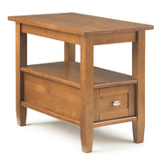 Handcrafted warm shaker-style coffee table by Simpli-Home with a smooth wooden surface and sturdy legs.