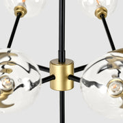 Black and gold Phoenix chandelier by Classic Home featuring elegant hanging design and intricate chandelier details.