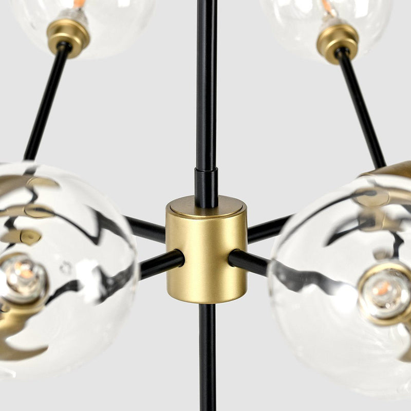 Black and gold Phoenix chandelier by Classic Home featuring elegant hanging design and intricate chandelier details.
