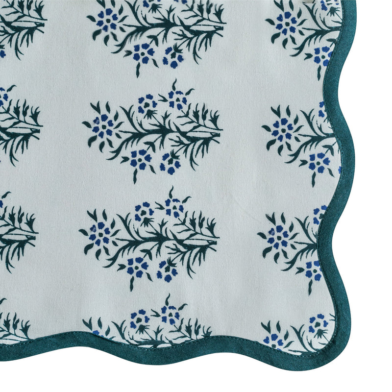 Set of four TOV Furniture Crissy cotton canvas printed napkins in blue cornflower design, featuring floral pattern and soft fabric.