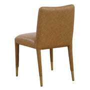 Set of two Conifer dining chairs by Uttermost with wooden legs and upholstered seats, showcasing elegant design and comfortable seating.
