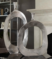 Set of two pearl silver aluminum vases from the Uttermost Cierra collection, featuring a sleek, modern design.
