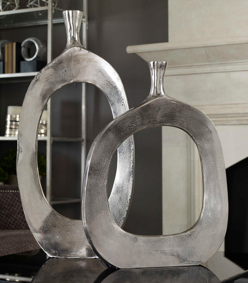 Set of two pearl silver aluminum vases from the Uttermost Cierra collection, featuring a sleek, modern design.