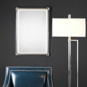 Silver metallic wall mirror by Uttermost, featuring a sleek, reflective mirror surface with a modern metallic frame.