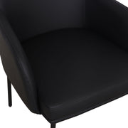 Pair of Sydney armchairs by TOV Furniture, showcasing modern design with plush upholstery and sleek wooden legs.