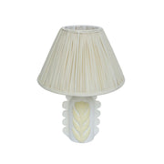Cream Edith table lamp by TOV Furniture featuring scalloped papier mache flower design and pleated fabric shade.