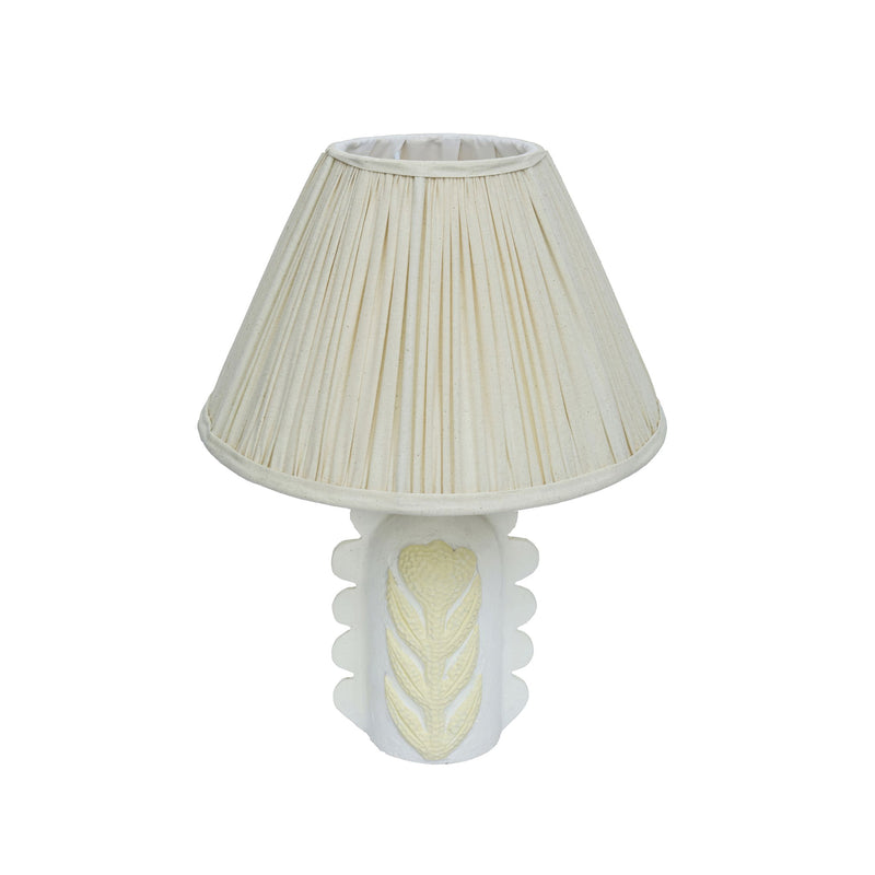 Cream Edith table lamp by TOV Furniture featuring scalloped papier mache flower design and pleated fabric shade.