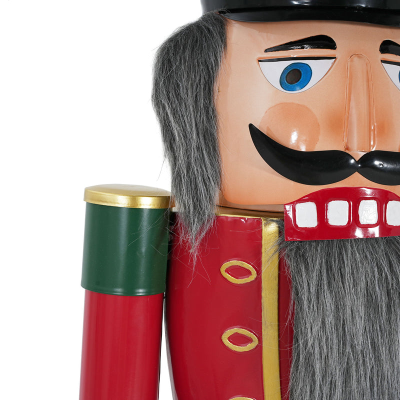 Noble House classic nutcracker holiday decor in green and red, festive Christmas figure standing with a detailed uniform.