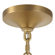Uttermost Bellaire gold pendant light with a glass shade, hanging from a ceiling fixture, showcasing elegant pendant lighting design