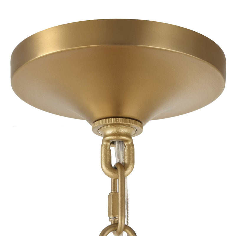 Uttermost Bellaire gold pendant light with a glass shade, hanging from a ceiling fixture, showcasing elegant pendant lighting design