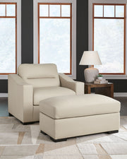 Signature Design Ashley Treasure Trove 2-piece chair and ottoman set with almond upholstery, stationary chair and matching ottoman.