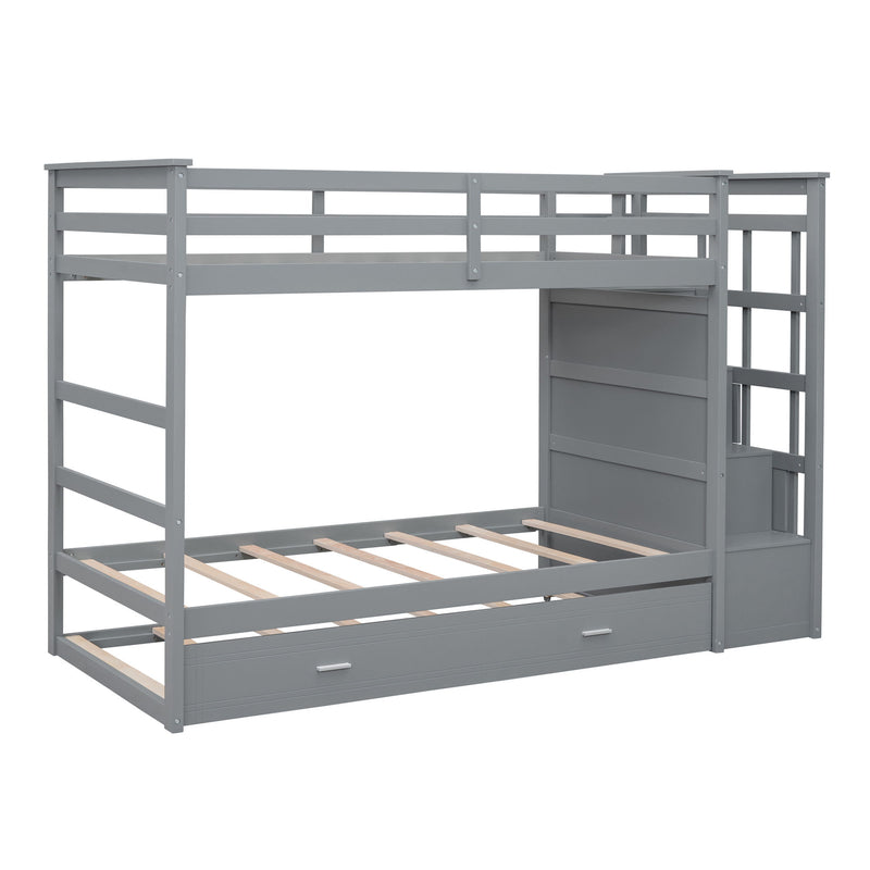 DreamHaus bunk bed with trundle and staircase, featuring sturdy wood construction and space-saving design for kids' bedrooms.