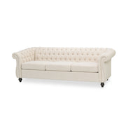 Noble House Chesterfield style 3-seater sofa with deep button tufting and classic stationary design in rich upholstery.