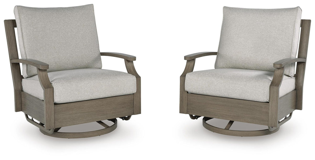 Brown and beige swivel glider chair with cushion from Rainier Ranch by Signature Design Ashley, featuring plush upholstery and a smooth spinning base.