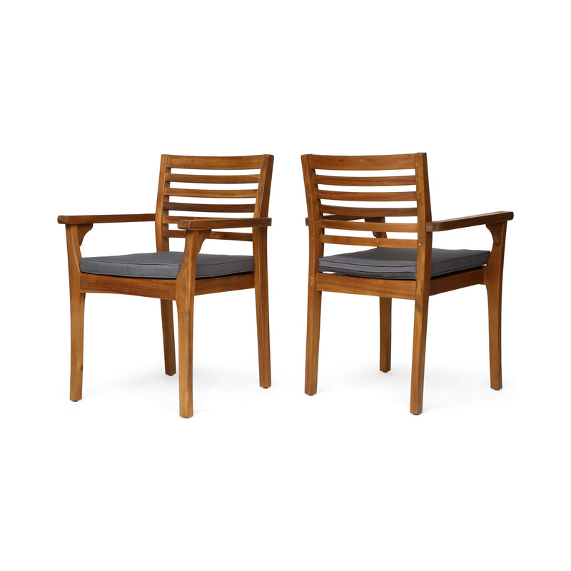 Set of two Noble House outdoor dining chairs with slat back and acacia wood frames in gray and teak finishes.