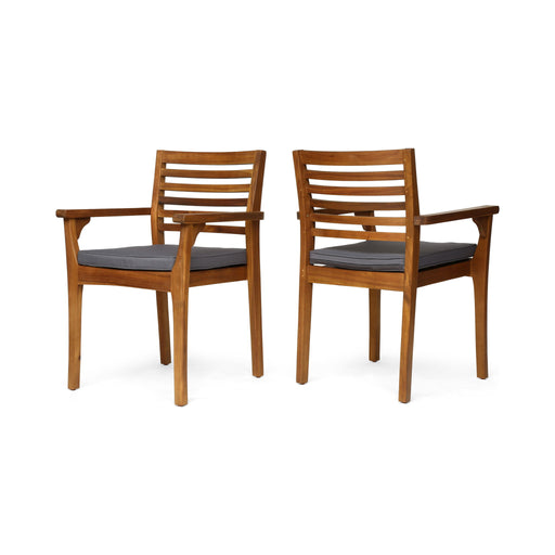 Set of two Noble House outdoor dining chairs with slat back and acacia wood frames in gray and teak finishes.