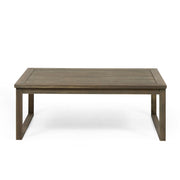 Noble House Samwell outdoor 2-piece coffee table and loveseat set with woven rattan frames and plush cushions.