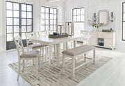 Signature Design by Ashley Robbinsdale rectangular counter height dining table with six matching chairs in a 7-piece set.