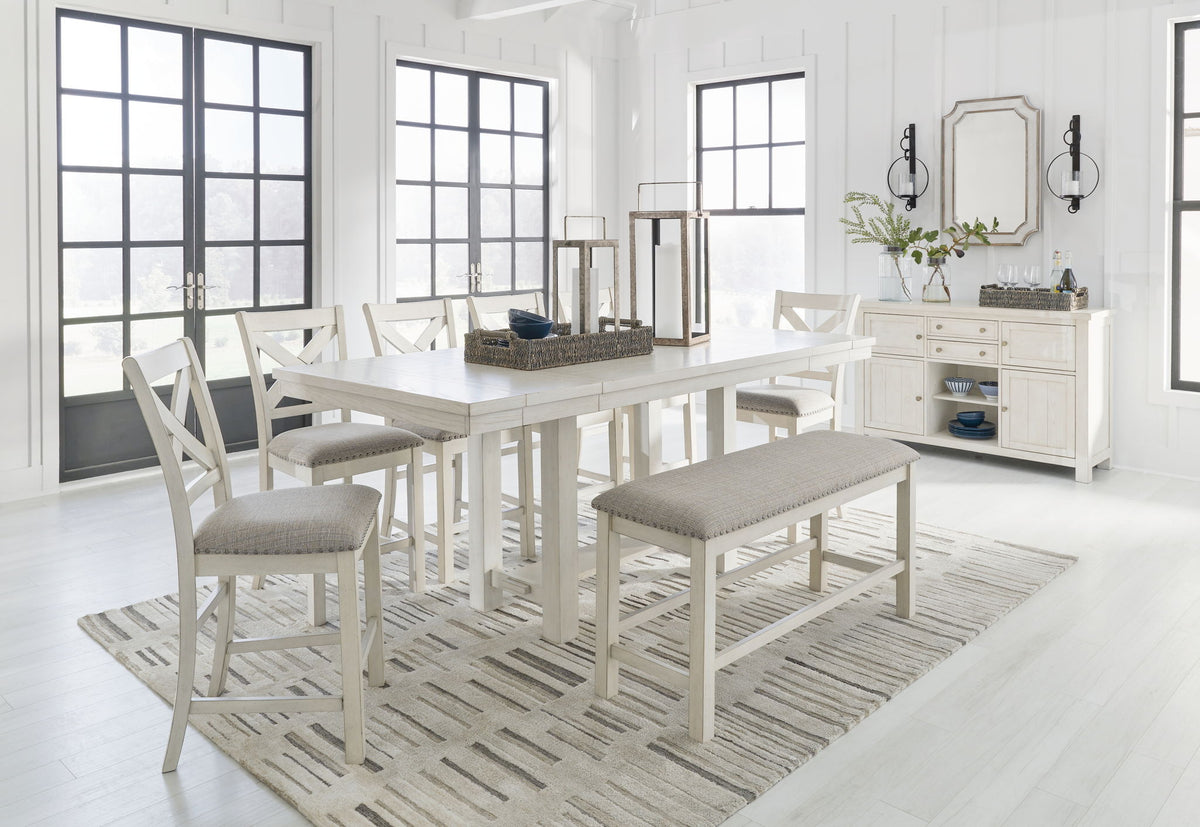 Signature Design by Ashley Robbinsdale rectangular counter height dining table with six matching chairs in a 7-piece set.