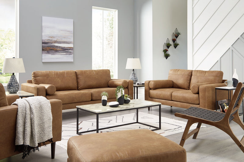 Signature Design by Ashley Telora living room set with stationary chair and matching ottoman in a stylish fabric.