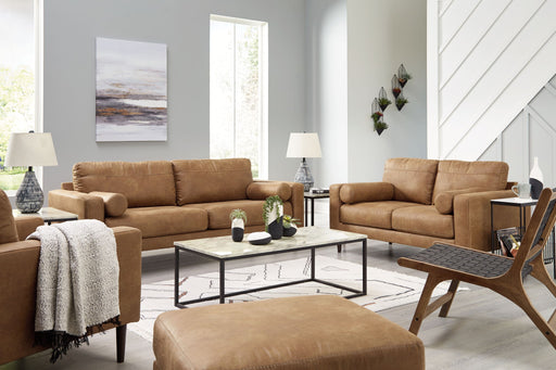 Signature Design by Ashley Telora living room set with stationary chair and matching ottoman in a stylish fabric.