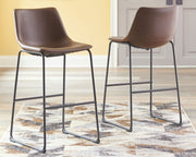 Set of two Signature Design by Ashley Centiar upholstered barstools with padded seats and backrests, featuring modern design and neutral fabric.