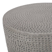 Outdoor lightweight concrete side table by Noble House, natural finish, with a round tabletop and sturdy supporting base.