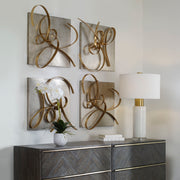 Set of two Uttermost gold Harmony metal wall art decor pieces featuring abstract, modern design for stylish home wall decoration.